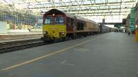 DB Cargo 66184 arrives at Carlisle with 4S49 Daventry to Grangemouth intermodal.<br><br>[Ken Browne 09/04/2016]