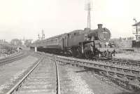 BR Standard class 4 80056 diverging at Cathcart West Junction on 28 August 1957 with a train for Whitecraigs. <br><br>[G H Robin collection by courtesy of the Mitchell Library, Glasgow 28/08/1957]