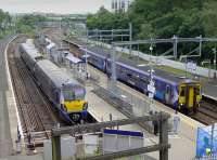 View from the steps at Springburn.  334032 at platform 3 with the 13.52 to Dumbarton Central with 156434 on a Stirling - Queen Street service alongside.<br>
<br><br>[Bill Roberton 18/07/2016]