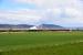 Black 5 No.44871,on the way to Kyle of Lochalsh,runs alongside the Beauly Firth near the site of the closed station at Clunes.The Kessock Bridge in the background.<br><br>[John Gray 02/05/2016]