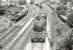V1 67631 approaching Knightswood South Junction with a Helensburgh - Bridgeton train on 1 August 1957. Turning off to the west is the freight only Cowdenhill Branch, which served various industrial locations in the area. <br><br>[G H Robin collection by courtesy of the Mitchell Library, Glasgow 01/08/1957]