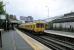 A Chester service calls at Birkenhead Central on 29/06/2016.<br><br>[David Panton 29/06/2016]