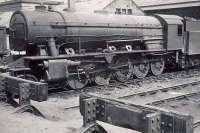 Ex-WD 2-10-0 73776 photographed on Polmadie shed in the summer of 1949. One of a batch of 25 such locomotives purchased from the War Department in 1948, most were not put into operational use until 1949/1950. This example became BR 90752 and survived until withdrawn from here at the end of 1961, before being cut up at Cowlairs some 6 months later. <br><br>[G H Robin collection by courtesy of the Mitchell Library, Glasgow 09/07/1949]