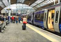 Business as usual for the Edinburgh via Falkirk High trains as the Class 170 DMUs return to Queen Street High level. Work on the tunnel slabtrack replacement finished ahead of schedule enabling reopening 2 days earlier than planned, with services to the north east of Scotland resuming on the Monday. <br><br>[Colin McDonald 07/08/2016]