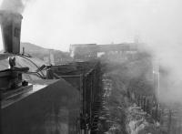 View from No.24 of a rake of empties being delivered to Pennyvenie Colliery. The view is from the east of Pennyvenie Nos 2, 3 and 7, No 7 still being active. <br><br>[Bill Roberton 20/12/]