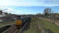 DRS 37423 working 2C45 Barrow to Carlisle loco hauled service top n tail with DBSO 9707 arriving at Wigton<br><br>[Ken Browne 09/04/2016]