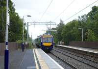 The 1119 from Glasgow Queen Street to Alloa departs from Lenzie under the wires on 10 August 2016.<br><br>[Colin Miller 10/08/2016]