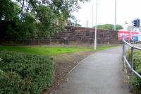 The road overbridge at the west end of the station - all that is visible is part of the main beam - [see image 32313] for 1973. All else is under a Tesco here.<br><br>[Colin Miller 07/07/2016]