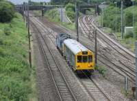 DRS 37419 propels the <I>slimline</I> Inspection Saloon 975025 <I>Caroline</I> along the Down Fast line past Farington Curve Junction on 12th July 2016. <br><br>[Mark Bartlett 12/07/2016]