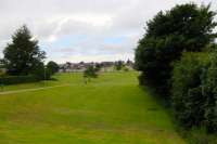 Looking west from the road bridge at the station site - [see image 24070] for a 1973 view.<br><br>[Colin Miller 07/07/2016]