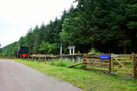 Progress at the Invergarry Station site. The foundations of the signal box are in place and part of the platform has been gravelled. A lamp post and station sign have been added.<br><br>[John Gray 02/08/2016]