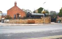 Looking like the last thing in upmarket garden ornaments, ex-Southern Railway S15 4-6-0 No 825 stands at the limit of the headshunt at Pickering in September 2010. View west across Park Street.<br><br>[John Furnevel 28/09/2010]