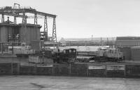 Monkton Coke Works on 31 October 1991, a year after closure.  Four shunters can be seen, an elevated-cab loco, another industrial and two ex-BR type 03s.<br><br>[Bill Roberton 31/10/1991]