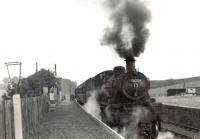 78054 with a train at Ladysbridge in the summer of 1960 on its way from Banff to Tillynaught. <br><br>[G H Robin collection by courtesy of the Mitchell Library, Glasgow 11/08/1960]