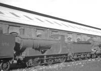 Ex-LSWR Drummond '700' class 0-6-0 30346 awaiting its fate alongside Eastleigh shed in September 1963. Built by Dubs & Co in 1897, the locomotive had been withdrawn from Feltham the previous February and was cut up at Eastleigh Works a month after the photograph was taken.<br><br>[K A Gray 25/09/1963]