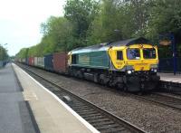 The latest Freightliner livery doesn't seem to suit 66's as well as 70's - which, let's face it, need all the cosmetic assistance they can get. [see image 55154] The train seen here passing through Warwick on 13 May 2016 is 443R, from Leeds FLT to Southampton FLT.<br><br>[Ken Strachan 13/05/2016]