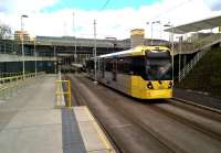 It's funny how stations by football stadia go very quiet just after the match has started. The tram is returning to the city centre from Ashton-under-Lyne [see image 55353].<br><br>[Ken Strachan 16/04/2016]