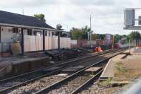 The weekend possessions continue between Euxton Jct and Lostock Jct in order that electrification preparation work can be carried out. The main element of work centres around the lowering of track to the south of Chorley and the rebuilding of the platforms. On 13 August 2016 the activity appeared to be a little less frenetic than when I visited 2 weeks ago but the bridge over a pedestrian underpass has been replaced and the formation to the south is now at the new level.<br><br>[John McIntyre 13/08/2016]