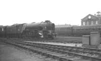 Ardsley based A1 Pacific 60135 <I>Madge Wildfire</I> about to pass the Doncaster Works clock on the approach to the station on 1 September 1962. The train is the 3.35pm Kings Cross - Leeds Central.<br><br>[K A Gray 01/09/1962]