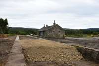 The closed station at Grantown-on-Spey (East) is being renovated. The plan, by Revack Lodge Estate, is to turn the building into a heritage centre and shop, with two railway coaches, placed on rails between the platforms, as a cafe. The coaches are stored nearby.<br><br>[John Gray 23/08/2016]