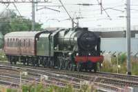 Ex LMS 4-6-0 no. 46115 Scots Guardsman with support coach head north on the WCML to Preston after completing a reversal which had taken them via Lostock Hall Jct. The loco was being positioned in readiness to take over the CME railtour to Carlisle.<br><br>[John McIntyre 20/08/2016]