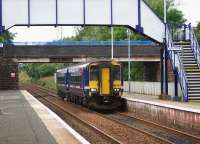 156462 on a limited stop service from Glasgow Central to Edinburgh via Shotts passes under the Biggar Road overbridge which is one of 10 bridges being modified prior to electrification. This bridge is currently (August 2016) closed to traffic to have its parapets and deck replaced. Work to demolish and replace another 17 bridges is also under way at various locations along the line.<br><br>[Colin McDonald 26/08/2016]