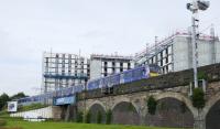 Westbound emu approaching Partick Station on 25 August 2016. The buildings are on the west end of the site of Partick Central station. No reopening here. More student accommodation.<br>
<br><br>[Colin Miller 25/08/2016]