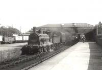 One of Dumfries shed's <I>Jumbo</I> 0-6-0s no 57349 stands in the bay in the summer of 1956 with a local train for Kirkcudbright.<br><br>[G H Robin collection by courtesy of the Mitchell Library, Glasgow 16/07/1956]