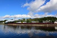 Just before the train arrived the water was a flat calm and then a light breeze started and ruined any chance of a reflection shot, but, at least the sun is shining as Black 5 No.44871 leaves Corpach on the way to Mallaig with the morning 'Jacobite'.<br><br>[John Gray 24/08/2016]