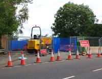 Somewhat unusually, the Biggar Road overbridge at Cleland station is being kept open for pedestrians during work to replace the papapets and deck prior to electrification of the Shotts line.<br><br>[Colin McDonald 26/08/2016]