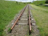 A section of remaining (or re-laid) track at the former Lyness Submarine Base in Orkney.<br><br>[John Yellowlees 03/07/2016]