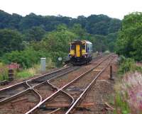 A clear pre-electrification view from Cleland station as 156462 on a limited stop service from Glasgow Central to Edinburgh via Shotts crosses the Cleland Viaduct. Vegetation clearance has been carried out and work to modify and replace overbridges is in progress (August 2016).<br><br>[Colin McDonald 26/08/2016]