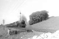 A southbound freight approaching Dunlop on 17 May 1952 behind class 5 4-6-0 45491. The train has recently cleared the A735 road bridge and is passing Dunlop's up distant signal. [Ref query 10890]<br><br>[G H Robin collection by courtesy of the Mitchell Library, Glasgow 17/05/1952]