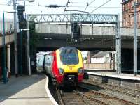 A Virgin CrossCountry Voyager leaves Carlisle for Edinburgh on 13 May 2003.<br><br>[John Furnevel 13/05/2003]