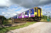 The last service from Preston to Ormskirk on the special timetable in connection with the Ormskirk Motorfest on 28 August 2016 is seen crossing the Leeds Liverpool Canal (Rufford Branch) to the south of Rufford station. The cameras on the right are in place on the occupation crossing to check that the crossing is being used correctly.<br><br>[John McIntyre 28/08/2016]