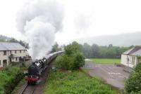 I happened to take a picture of the morning Jacobite almost exactly 46 years on in the very same location as the query image [see image 54302], passing milepost 99 and Inverlochy Primary on the approach to Fort William Junction, hauled by Black 5 45407 Lancashire Fusilier. Typical Fort William weather.<br><br>[Mark Wringe 06/07/2016]