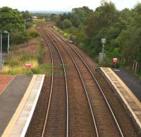 Pre-electrification view from the new footbridge at Fauldhouse on 31st August 2016. The Wilsontown, Morningside and Coltness Railway passed under the tracks of the Cleland and Midcalder Line just about the point where the line disappears behind the trees in the distance.<br><br>[Colin McDonald 31/08/2016]