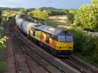 Colas 60026 leads the Craiginches - Oxwellmains empty cement train, largely composed of new JPA tanks, past Inverkeithing East Junction on 26 August.<br><br>[Bill Roberton 26/08/2016]