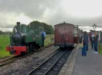 'Axe' saunters around its train at Killington Lane. The guard told me that the railway needs to have seven planning applications approved to cross the lane.<br><br>[Ken Strachan 28/08/2016]