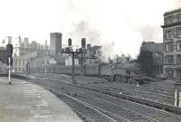 A Kilmarnock local leaving St Enoch on 31 March 1954 behind Hurlford 2P 4-4-0 40571.  <br><br>[G H Robin collection by courtesy of the Mitchell Library, Glasgow 31/03/1954]