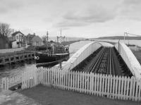 Fishing boat heading south along the Caledonian Canal past Clachnaharry swing bridge.<br><br>[Bill Roberton 28/03/1988]