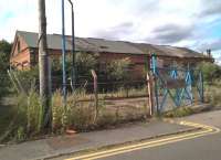 I recently combined a business trip with visits to all three former stations in Loughborough. Should you wish to visit Derby Road station, I suggest some haste, as the only remaining building is the goods shed, and it doesn't look good. The tenants have gone out of business and felt is peeling off the wooden roof. Location is in Station Avenue, off Station Road. [See image 48830] for a happier relic of the same line. [Ref query 44067]<br><br>[Ken Strachan 03/08/2016]