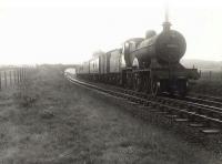 A Dumfries - Stranraer train photographed shortly after leaving New Galloway station on 14 July 1956 behind Fowler 2P 4-4-0 40623. [Ref query 46221]  <br><br>[G H Robin collection by courtesy of the Mitchell Library, Glasgow 14/07/1956]