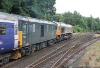 GBRf 66737 <I>Lesia</I> and 73969 depart from Pitlochry double heading the northbound sleeper on the morning of 19th July 2016. <br><br>[Mark Bartlett 19/07/2016]