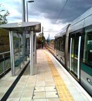 To paraphrase Betjeman: very straight, the GC [see image 10962]. The GC trackbed actually diverges to the left of the tram tracks in this view at Ruddington Lane in April 2016 - notice the trees on the embankment in the distance.<br><br>[Ken Strachan 23/04/2016]