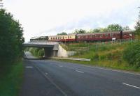 The morning run of the ScotRail 'Borders Line Steam Special' crosses Gore Glen Viaduct over a very quiet A7 as it approaches Gorebridge on Sunday 4 September 2016. The special is hauled by ex-LMS 4-6-0 no 46100 <I>Royal Scot</I>.<br><br>[John Furnevel 04/09/2016]