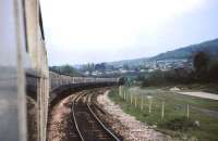 Having just passed Bathampton Jct, a Bristol to Portsmouth service with a Class 33 and a rake of Mark 1s takes the Trowbridge line in May 1985. [Ref query 5559]<br><br>[John McIntyre /05/1985]