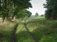 Looking north along the course of the Fordell Railway at Vantage.  The hill in the background is actually spoil at Muir Dean opencast site, now closed.<br><br>[Bill Roberton 11/09/2016]