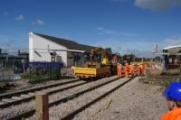 Weekend reconstruction work on Chorley station is continuing with both lines now relaid and the down platform face still being rebuilt. On 11 September 2016 it was also noticed that the up platform (on the right) has been worked on and now has a temporary surface following the track replacement.<br><br>[John McIntyre 11/09/2016]