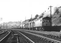 Haymarket BRCW Type 2 D5306 takes a northbound freight away from Hawick on 6 March 1969.<br><br>[Dougie Squance (Courtesy Bruce McCartney) 06/03/1969]